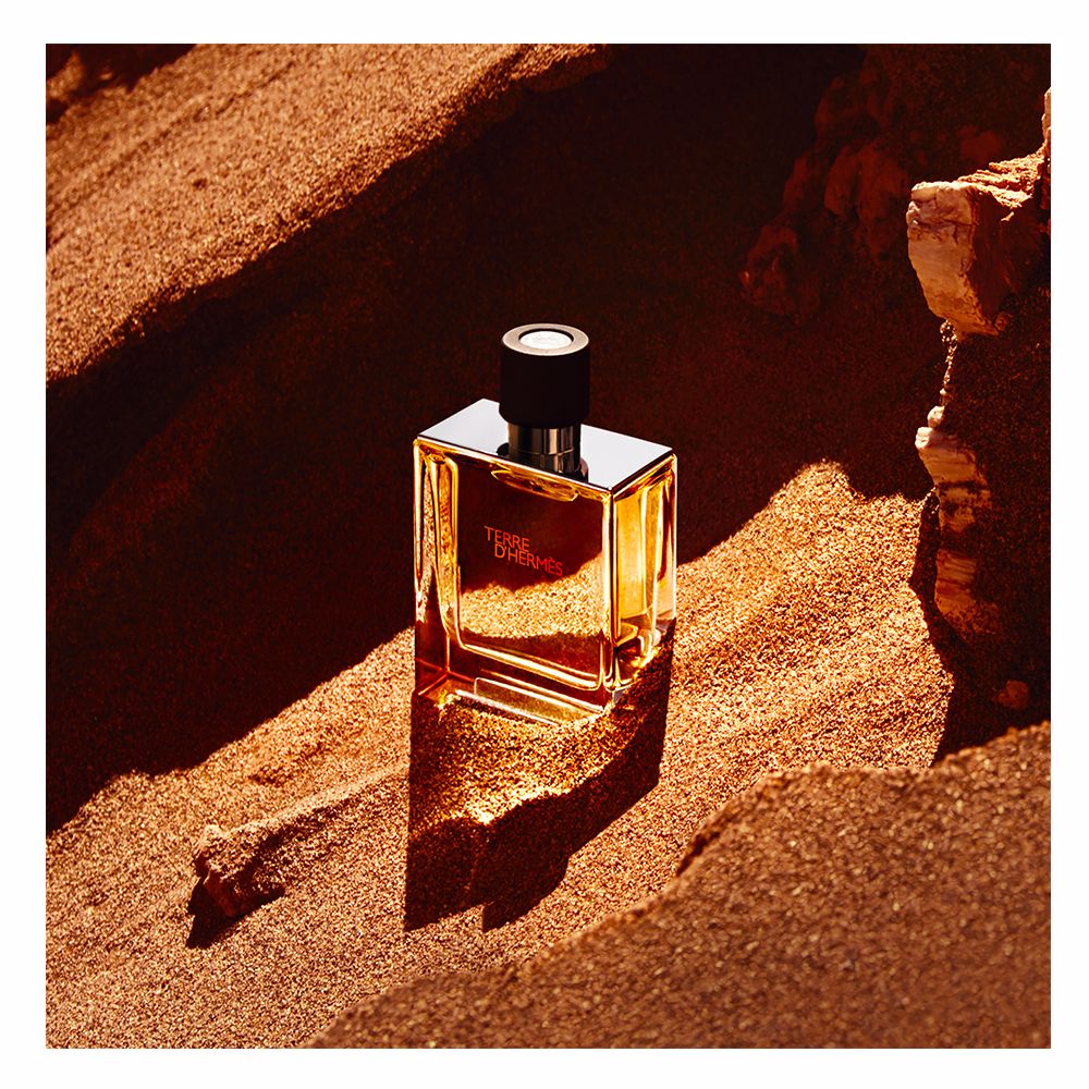 75 ml amber glass parfum with metal-shouldered bottle and sliding cap