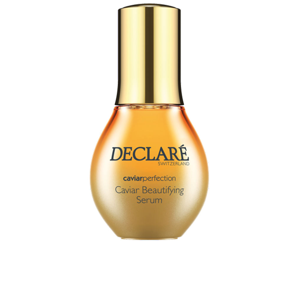 50 ml glass bottle of caviar face serum with pipette, pale gold liquid