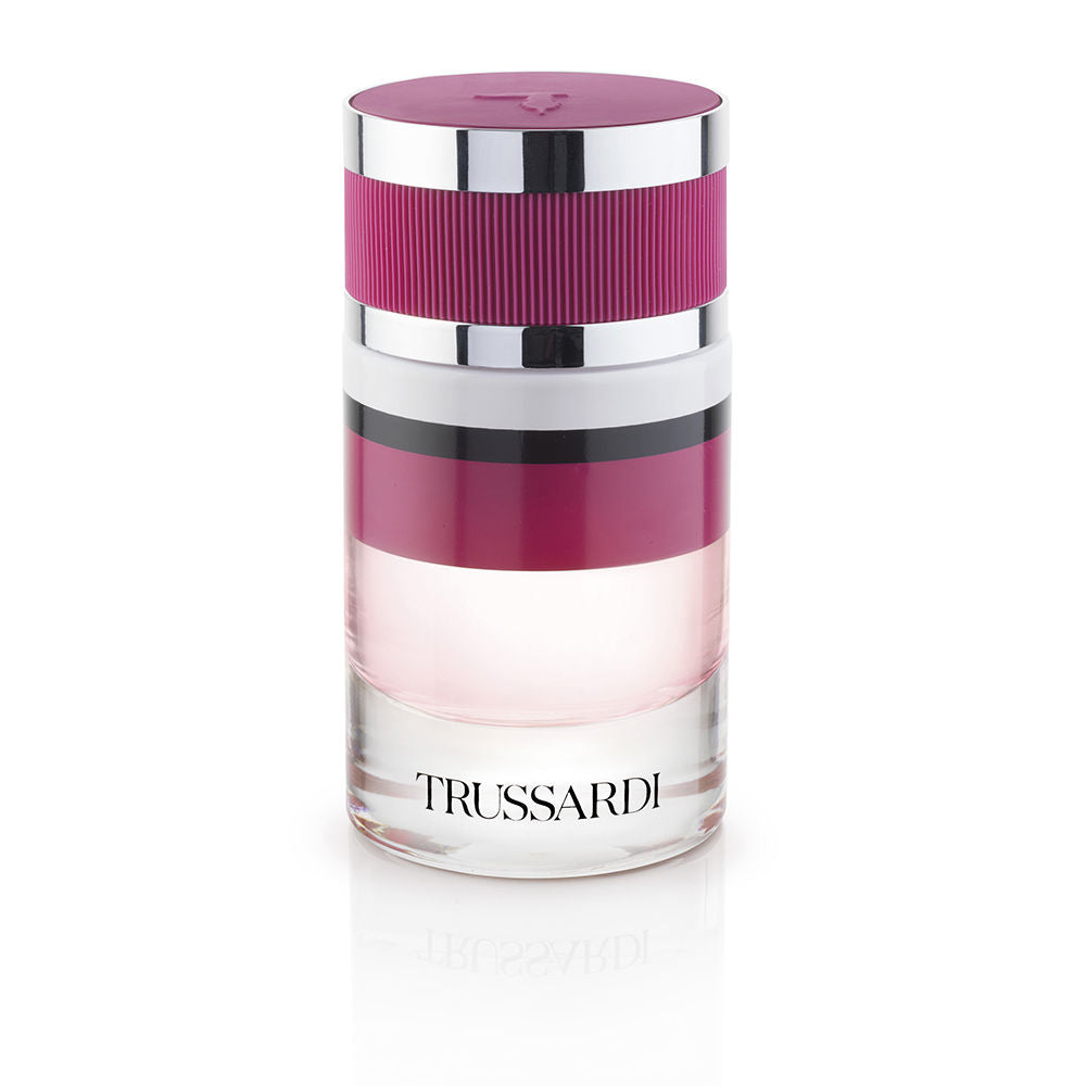 Glass perfume bottle with deep red liquid, gold-finish cap, 60 ml