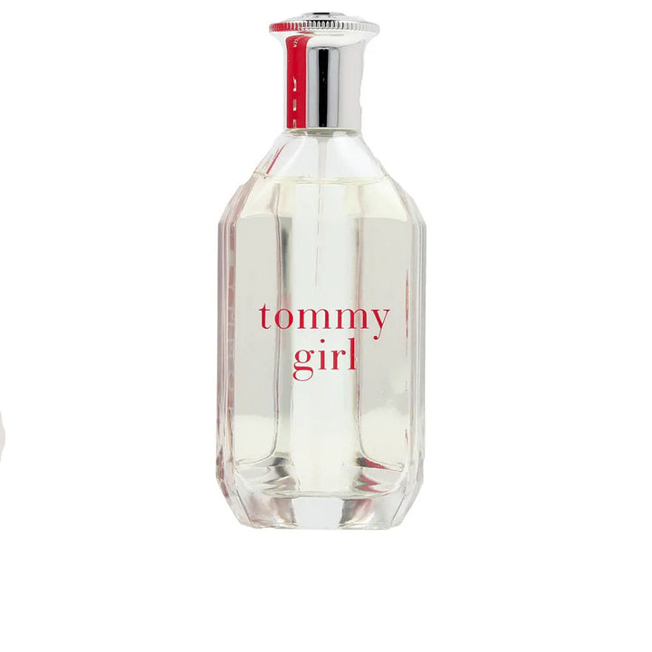 Clear curved 100 ml perfume bottle with silver cap, floral-woody scent for Women