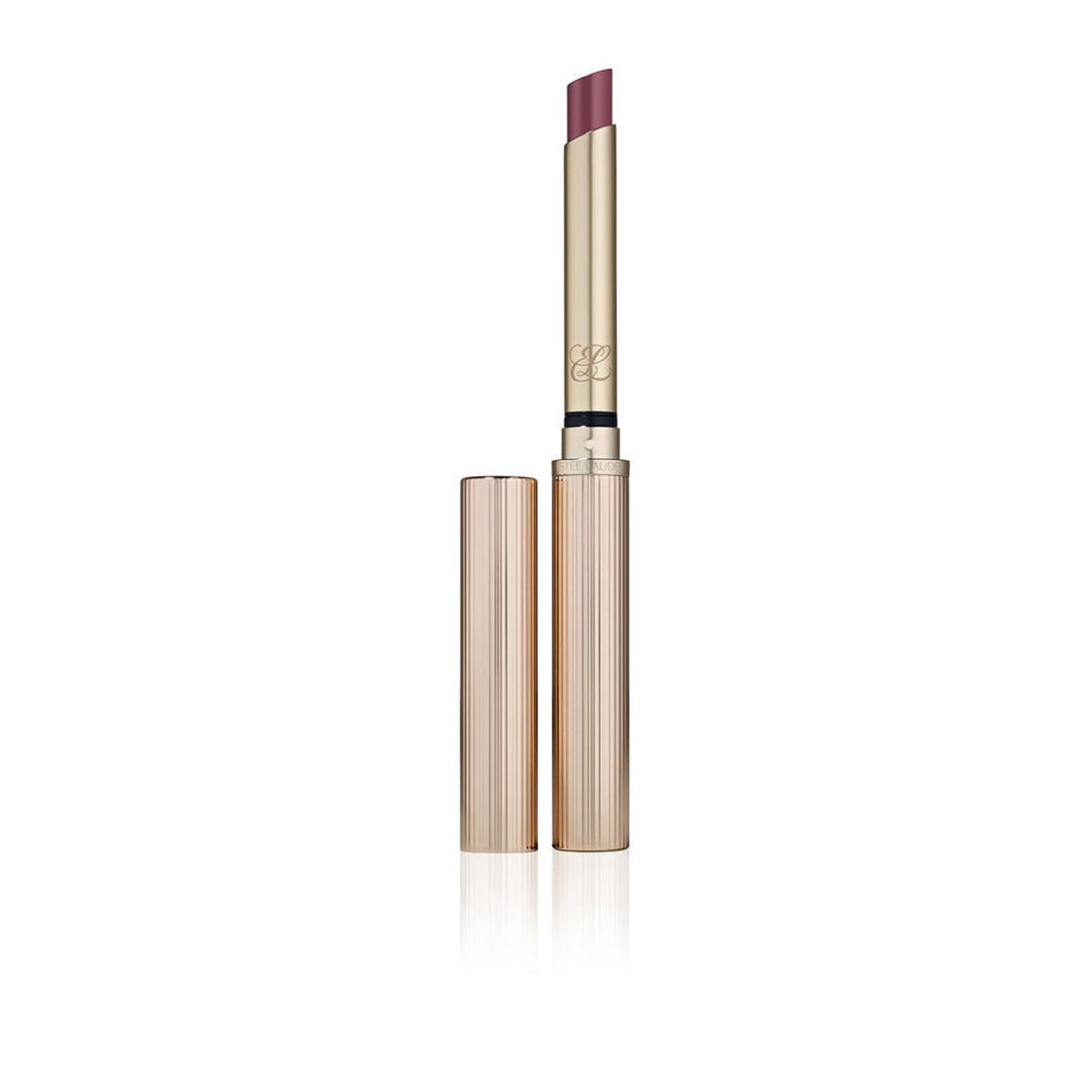 Glossy creamy rosé lip balm in ridged rose‑gold case, single bullet shown