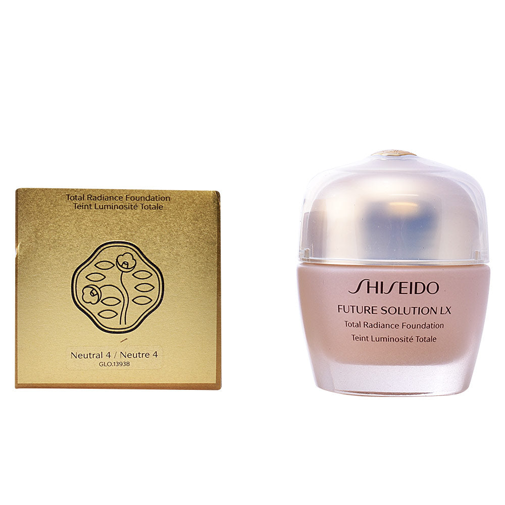 Shiseido Gold and beige foundation jar with lid beside matching box, plastic jar and cardboard box visible