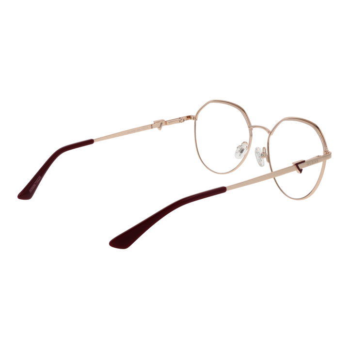 Rose gold thin metal round eyeglasses with burgundy plastic temple tips on white background
