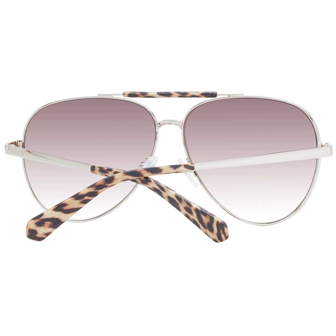 Silver aviator sunglasses with purple gradient lenses and tortoiseshell top bar and temple tips on white background