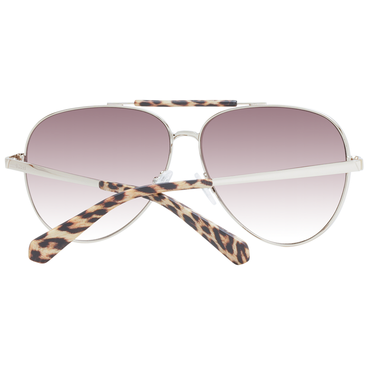 Silver aviator sunglasses with purple gradient lenses and tortoiseshell top bar and temple tips on white background