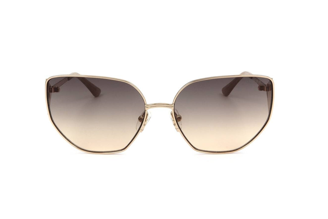 Gold oversized geometric sunglasses with gradient brown lenses and triangular rhinestone accents on temples