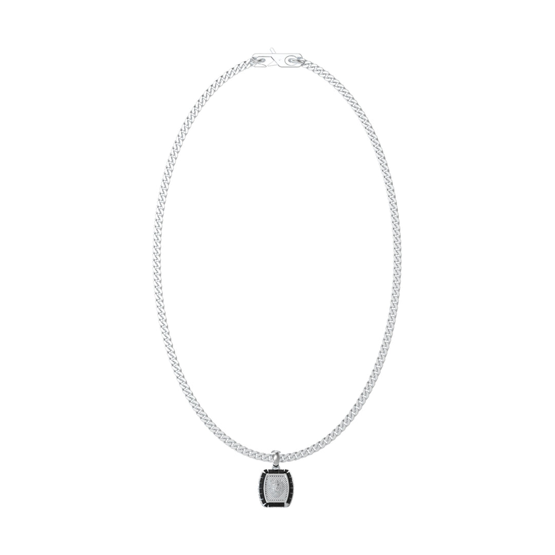 Silver chain necklace for Man with black geometric pendant on dark background