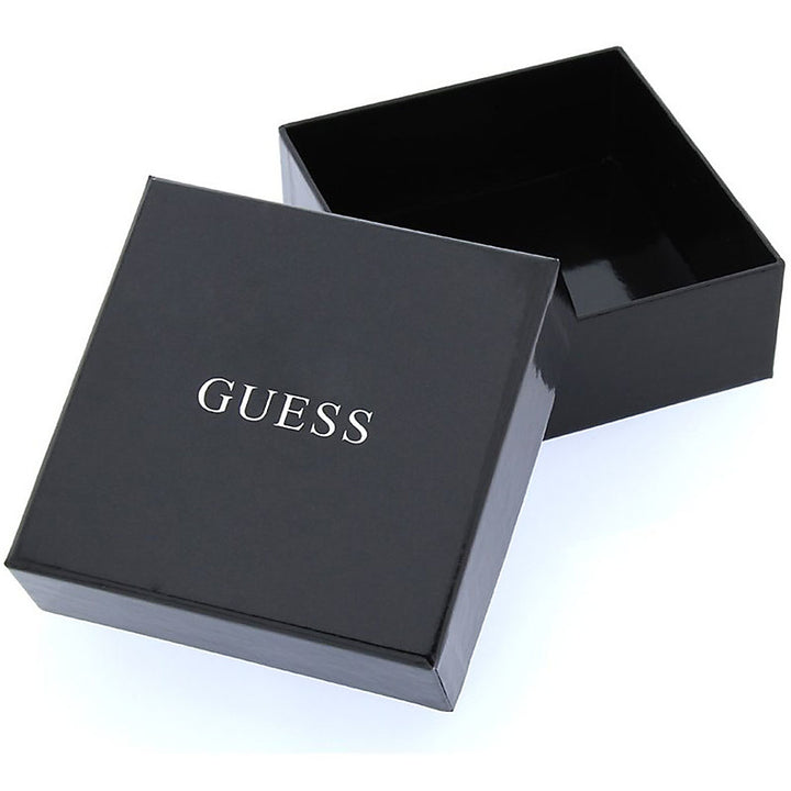 Silver ring with flower motif set with clear stones inside glossy beige-black jewelry box