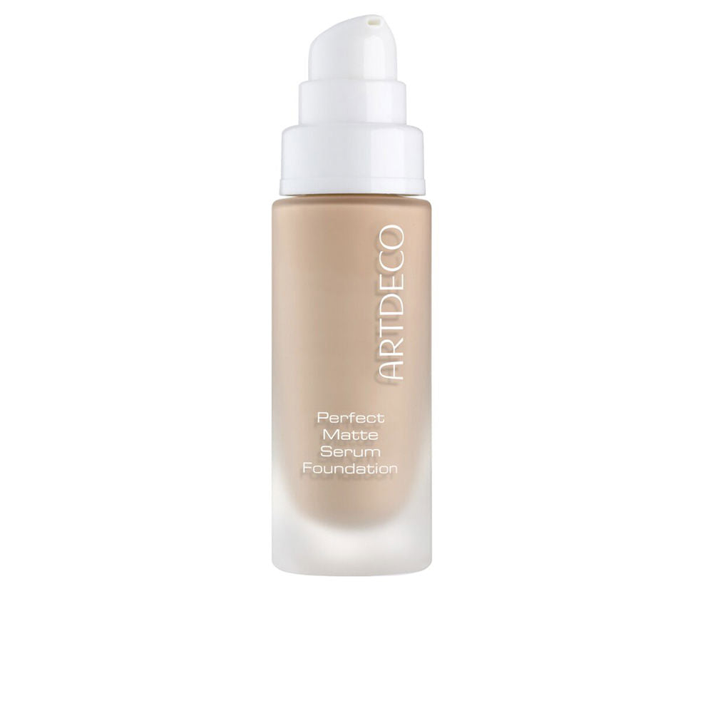 20 ml glass bottle of medium tan liquid foundation with pump, natural matte finish