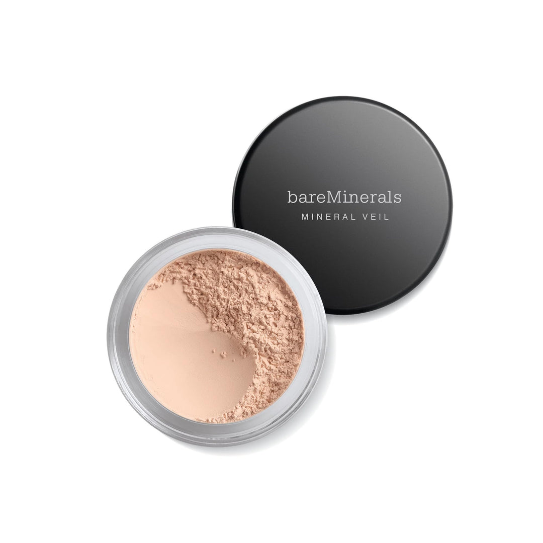 Small jar of translucent loose mineral finishing powder, tinted 9 g, matte finish
