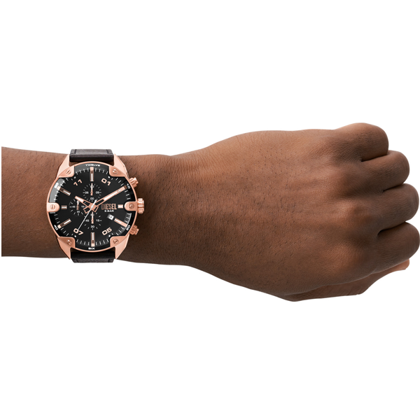 Rose gold chronograph watch on black leather strap showing subdials and date display