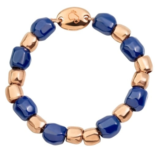 Rose gold plated and blue beaded stretch bracelet alternating polished beads on wrist