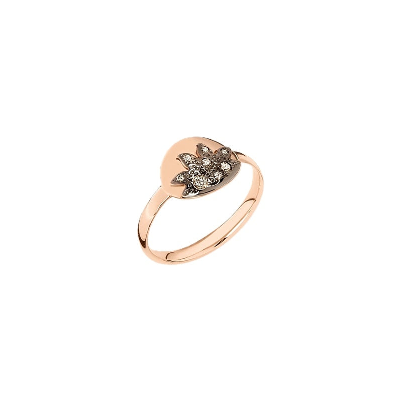 Rose gold decorative ring featuring embedded clear diamonds on sculpted band, polished finish