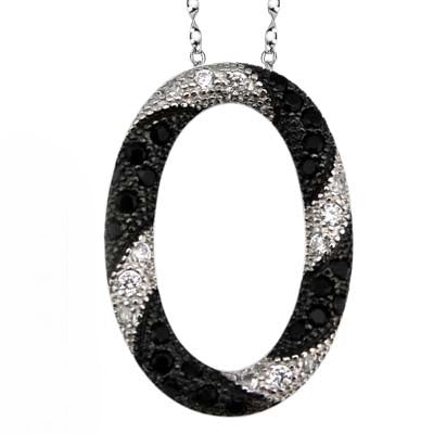 Oval black and silver pendant necklace with alternating black and white gemstones on a delicate chain