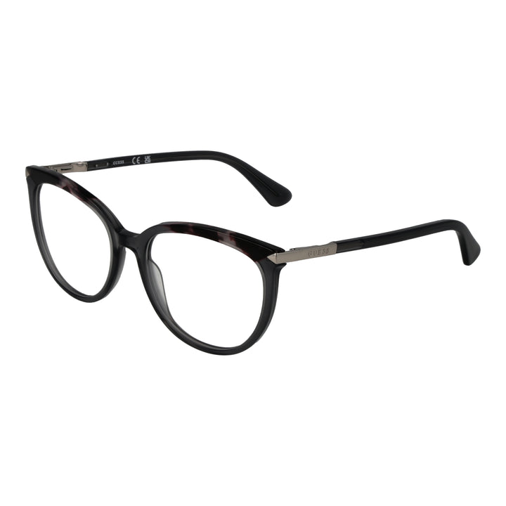 Black tortoiseshell round eyeglasses with metal temple accents and engraved brand detail