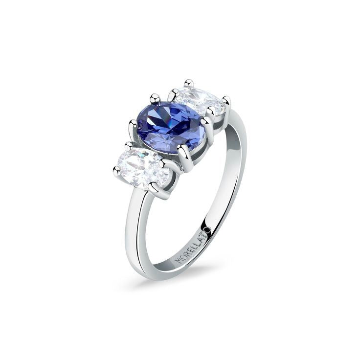 Silver three-stone ring with oval blueish zircon center and two white zircons in prong settings on polished band